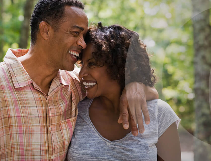 Man and woman walking outdoors