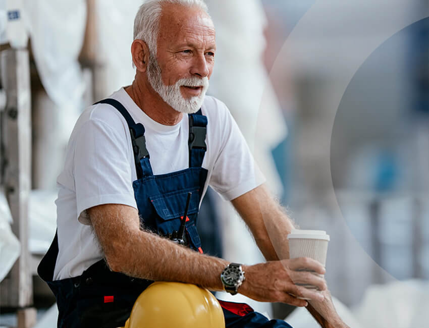 Mature man working in a warehouse